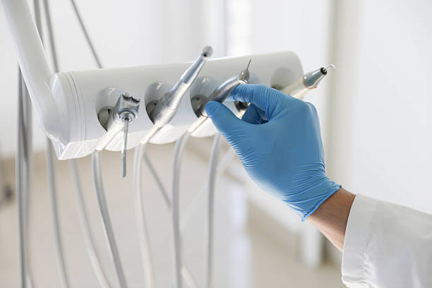 Professional Tooth Extraction technician working in Marshfield Hills, MA